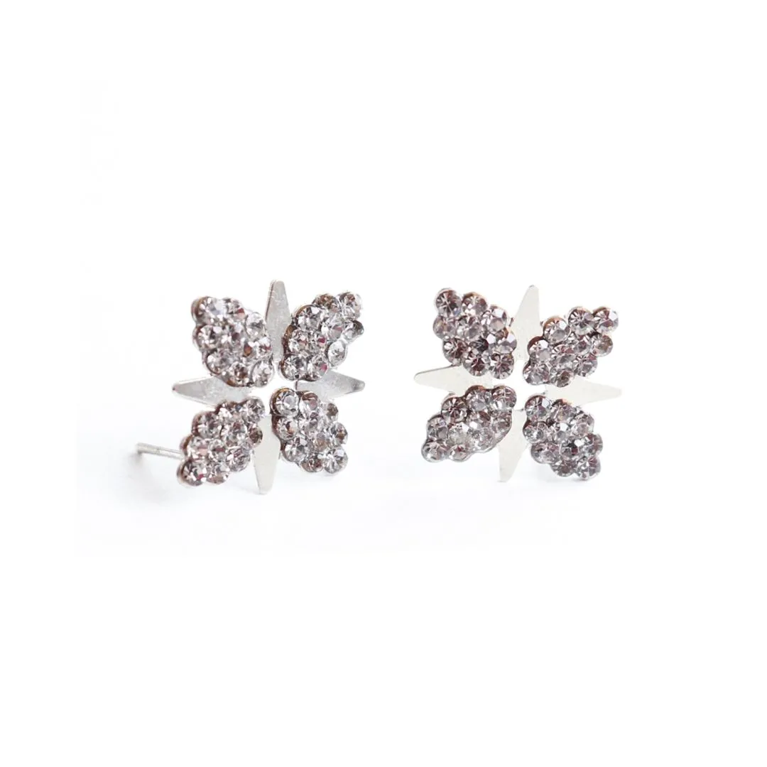 BRINCO ESTRELAS DE QUATRO PONTAS COM BASE E STRASS PRATA 